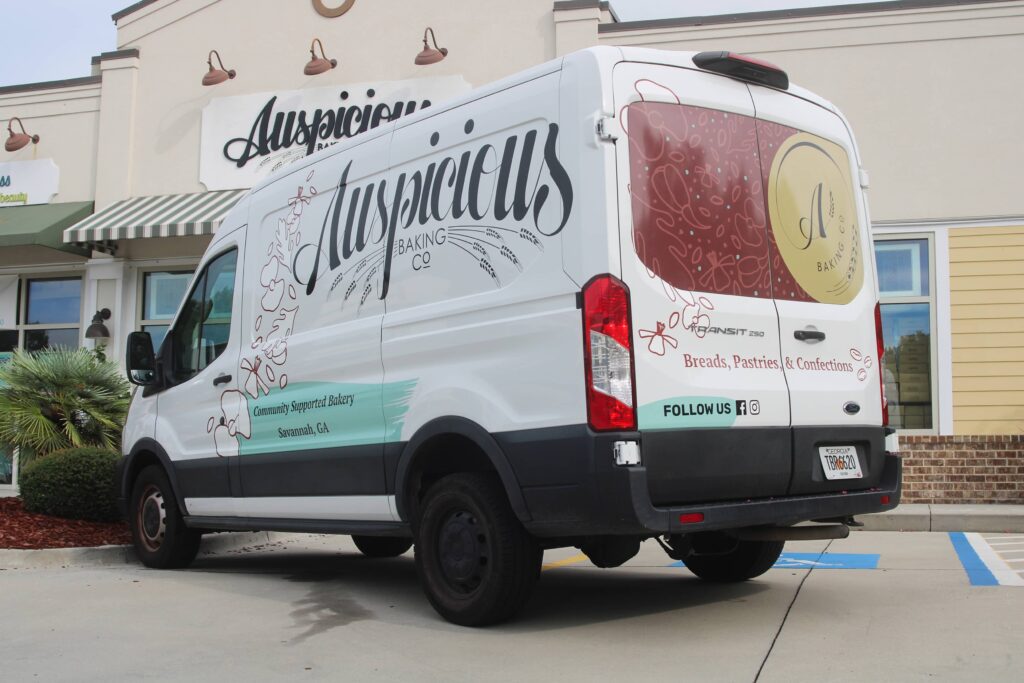 Custom van wrap (partial) created for Auspicious Baking Co by Olive Ridley Studios