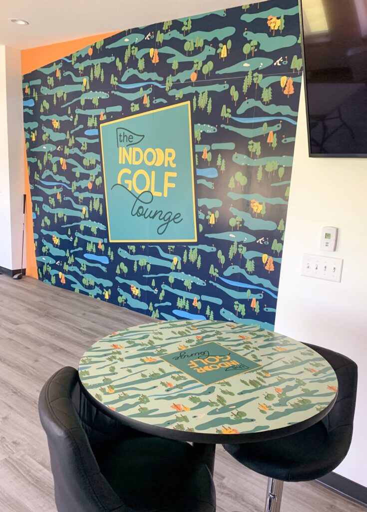 Branded interior - focal wall and custom table wraps - created for The Indoor Golf Lounge by Olive Ridley Studios