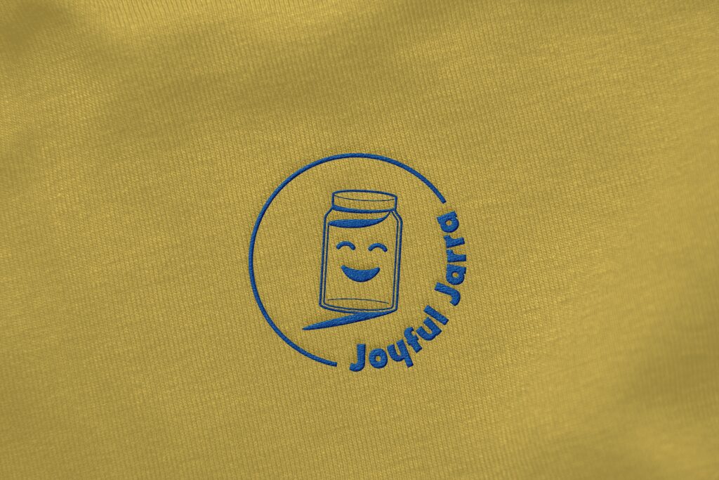 Visual brand identity design created for Joyful Jarra by Olive Ridley Studios - logo shown as an embroidery mockup