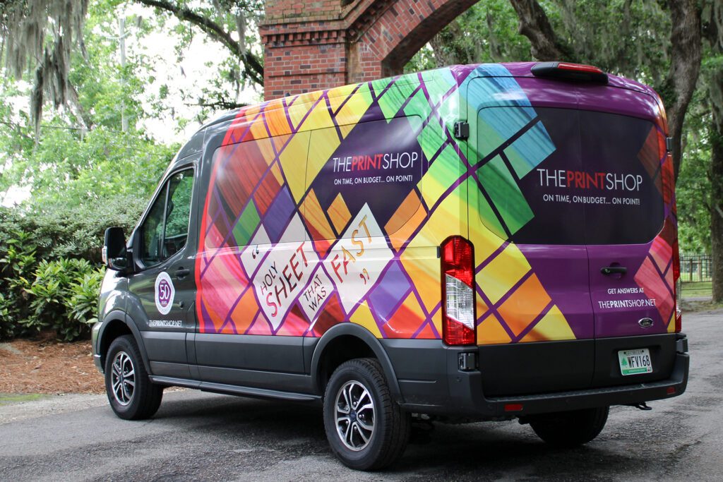 Vehicle wrap design for The Print Shop by Olive Ridley Studios