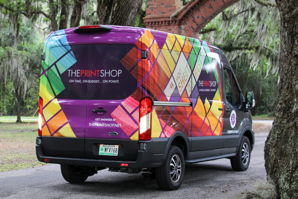 Vehicle wrap design for The Print Shop by Olive Ridley Studios