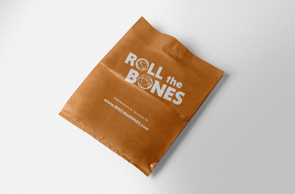 Visual brand identity design created for Roll The Bones by Olive Ridley Studios - Shopping bag mockup